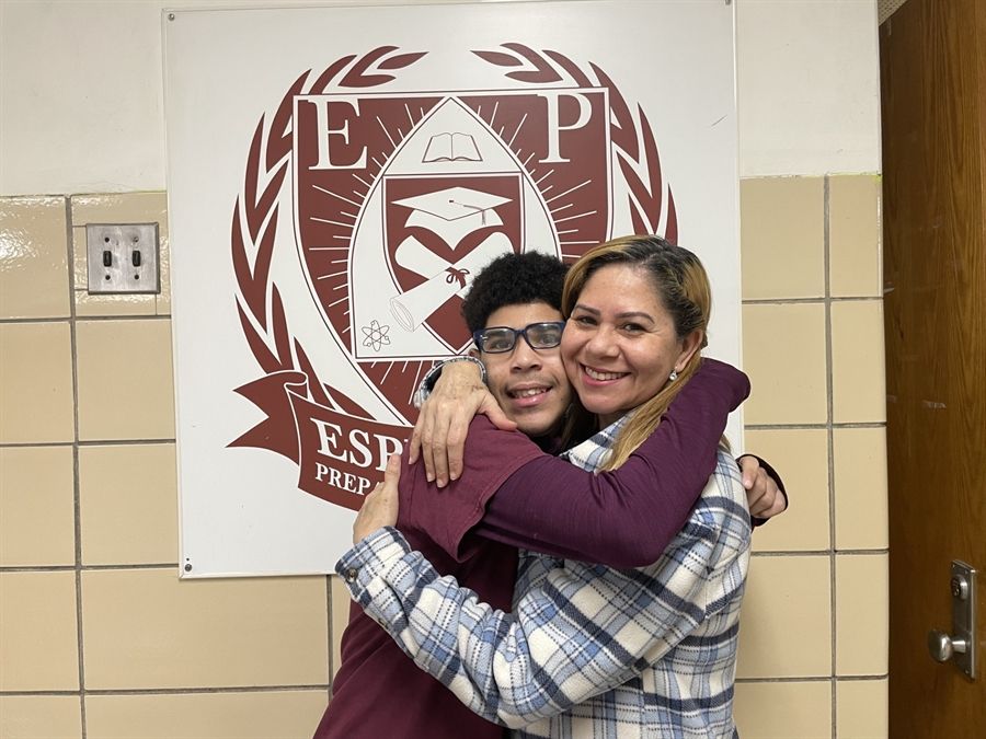 Mother and son hugging
